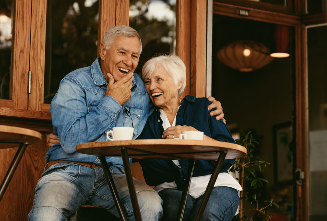 an older couple enjoying coffee together
